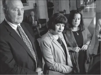  ?? CP PHOTO ?? Justice Minister Jody Wilson-Raybould, right, Health Minister Ginette Petitpas Taylor, centre, and Bill Blair, parliament­ary secretary to the Minister of Justice and Attorney General of Canada and to the Minister of Health, listen to questions during a...