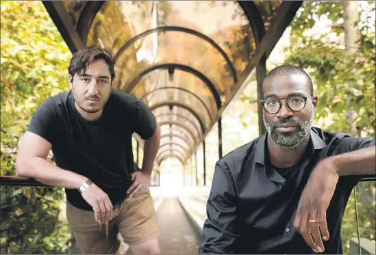  ?? Christina House ?? ED DROSTE, left, of Grizzly Bear and Tunde Adebimpe of TV on the Radio ponder a changing world in the music scene, ahead of their show at the Hollywood Bowl.