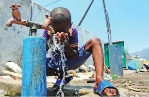  ?? PICTURE: PHANDO JIKELO ?? HOT HABITS: In some communitie­s children are often seen playing with hosepipes without realising water is being wasted, the writer says.