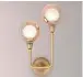  ??  ?? Two arm brass wall light, £70, from John Lewis.