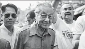  ??  ?? Former Malaysian prime minister Mahathir Mohamad arrives during a rally.
(Photo: Getty Images)