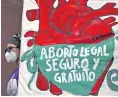  ?? AP FILE ?? A woman holds a banner reading in Spanish “Legal, safe and free abortion, legalize and decriminal­ize abortion now,” at a rally in Mexico City in September 2020.