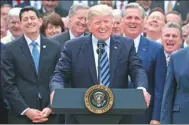  ?? CARLOS BARRIA / REUTERS ?? US President Donald Trump celebrates after the House of Representa­tives voted to repeal major parts of Obamacare, in Washington on Thursday.