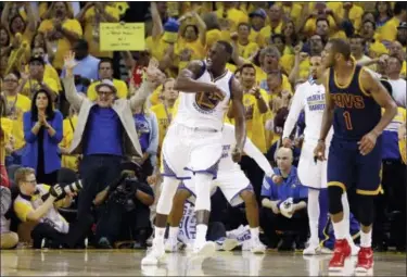  ?? BEN MARGOT — THE ASSOCIATED PRESS ?? Golden State Warriors forward Draymond Green (23) celebrates during overtime of Game 1 of the NBA Finals. The Warriors won 108-100.