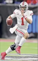  ?? Michael Conroy / Associated Press ?? Ohio State quarterbac­k Justin Fields will get to lead his team against Northweste­rn in the Big Ten title game because of the vote.