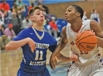  ?? STAFF PHOTO BY ANGELA LEWIS FOSTER ?? Brainerd’s Kentrell Evans tries to work his way around Livingston’s Cody Ray during their Class AA sectional earlier this month. Starting today in Murfreesbo­ro, Brainerd will try to return to the state championsh­ip game.