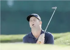  ?? Chris O’Meara/THE AS OCIATED PRESS ?? Matt Every reacts after nearly holing out from the sand trap on the 17th hole at Bay Hill on Sunday in Orlando, Fla.