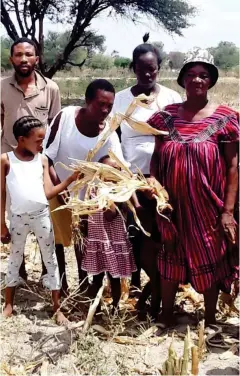  ?? Photo: Contribute­d ?? No harvest… Some of the farmers from the Tsumkwe constituen­cy display their affected crops as a result of poor rainfall in the area.
