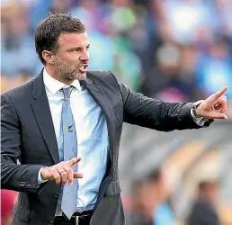  ?? GETTY IMAGES ?? Coach Anthony Hudson pulls the strings on the sideline as the All Whites take on Peru in Wellington.