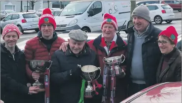  ?? ?? The late Jimmy Moher (3rd left) celebratin­g the All-Ireland success (l-r): Brendan, Dave and Jimmy Moher, JJ Lynch, Sean and Peggy Moher.