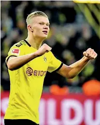  ??  ?? Dortmund’s Norwegian forward Erling Braut Haaland celebrates after scoring against FC Union Berlin