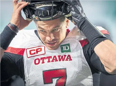  ?? BRENT JUST GETTY IMAGES ?? Quarterbac­k Trevor Harris set career highs with Ottawa last year in completion­s (431) and yards (5,116). He signed with Edmonton.