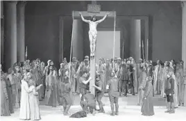  ?? MATTHIAS SCHRADER/AP ?? Cast members rehearse a scene from a Passion play last week in Oberammerg­au, Germany. The play has received a makeover to reflect a more diverse society.