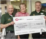  ??  ?? Wokingham Flower Club presented a cheque for £1,000 to Heartstart First Responders