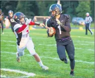  ?? AIMEE BIELOZER — FOR THE MORNING JOURNAL ?? Keystone’s Ryne Shackelfor­d runs for yards against Brookside on Sept. 18.