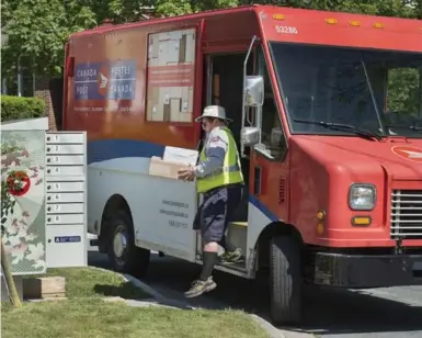  ?? ANDREW VAUGHAN/THE CANADIAN PRESS FILE PHOTO ?? The parcel delivery business has been a major contributo­r to Canada Post’s revenues in the past few years.