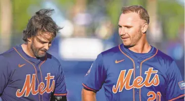  ?? RICH STORRY/USA TODAY SPORTS ?? Mets second baseman Jeff McNeil, left, and first baseman Pete Alonso look on during the first inning of a game against the Cardinals on Tuesday at Clover Park in Port St. Lucie, Fla.
