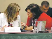  ?? DARRON CUMMINGS/THE ASSOCIATED PRESS ?? Connecticu­t Secretary of State Denise Merrill, left, and Rhode Island Secretary of State Nellie Gorbea talk before a voter registrati­on meeting Saturday at the National Associatio­n of Secretarie­s of State conference in Indianapol­is.