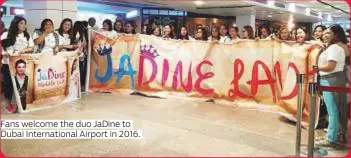  ??  ?? Fans welcome the duo JaDine to Dubai Internatio­nal Airport in 2016.