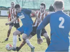  ??  ?? Sunderland RCA’s Stephen Callen battles against Seaham Red Star.