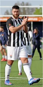  ?? ?? Jack Batten applauds the away following after the win