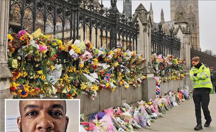  ??  ?? Tributes: The scene yesterday outside the Houses of Parliament where the public have laid flowers