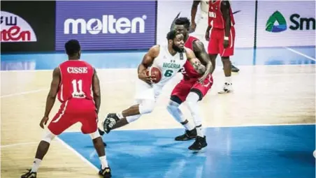  ??  ?? D’Tigers’ Ike Diogu (second left) was the star performer of the Nigerian team at the just concluded 2021 AfroBasket qualifiers in Kigali, Rwanda