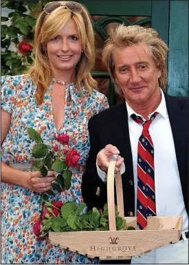  ??  ?? Regulars: Sir Rod Stewart and wife Penny at the Chelsea Flower Show