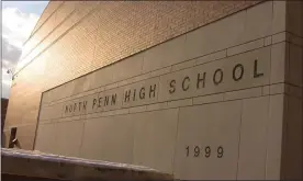  ?? COURTESY OF NORTH PENN SCHOOL DISTRICT ?? Sun shines on the front entrance of North Penn High School, where engravings indicate the school name and the date of the last renovation.