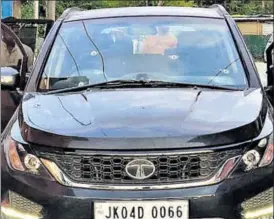  ?? WASEEM ANDRABI/HT PHOTO ?? The damaged car of journalist Shujaat Bukhari, who was shot dead by unidentifi­ed gunmen outside his office at Press Colony in Srinagar on Thursday.