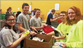  ?? SUBMITTED ?? From left: Landscape and Greenhouse Management students, Sophia Couch (Keystone), Don Sabella (Amherst), Billy Keller (Midview), Tommy Keller (Midview), Bailey Zorn (Keystone) enjoy their time at Second Harvest Food Bank.