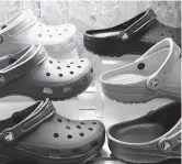  ?? DREAMSTIME ?? Crocs have been making a comeback with people stuck indoors amid the pandemic.