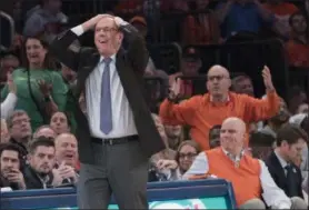  ?? MARY ALTAFFER - THE ASSOCIATED PRESS ?? Syracuse head coach Jim Boeheim, foreground, reacts during the second half of an NCAA college basketball consolatio­n game against Oregon in the 2K Empire Classic, Friday, Nov. 16, 2018, at Madison Square Garden in New York.