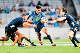  ?? Photo / Photosport ?? Rieko Ioane’s two tries were crucial for the Blues.