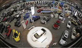  ?? TY GREENLEES / STAFF ?? A look at the 2016 Dayton Auto Show. The Dayton Convention Center has 150,000 square feet of floor space and 77,000 square feet of exhibit space.