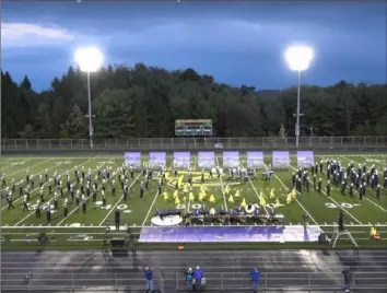  ??  ?? The Hampton High School marching band performs its 2018 show "City of Stars," inspired by the movie "La La Land."