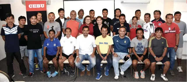  ?? SUNSTAR FOTO/RUEL ROSELLO ?? GROUND RULES. Organizers and coaches of the 7th SunStar Football Cup meet to discuss the ground rules and regulation­s of the tournament, which will be on Nov. 24 and 25 at the Cebu City Sports Center.