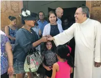  ?? — AP ?? Across Guam, priests, including Pastor Jose Antonio Abad, are praying for peace in the face of a missile threat from North Korea.