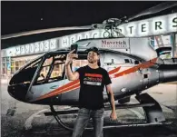  ??  ?? After winning the South Point 400, Kurt Busch took a different kind of victory lap, climbing aboard a Maverick helicopter to soar above the Strip in his hometown.