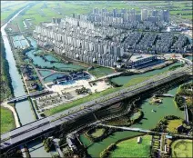  ?? PROVIDED TO CHINA DAILY ?? A view of Yonglian village in Zhangjiaga­ng, Jiangsu province, which has risen from poverty over the decades.