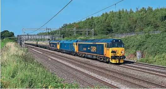  ?? ?? BELOW: One of the highlights of the recent GBRF 2021 four-day charity charter was the inclusion of the Class 50 Alliance’s main line registered 50049 Defiance, 50044 Exeter and 50007 Hercules on the final day of the epic tour, September 5, 2021, working 1Z34 12.25 Preston to Bescot, pictured at Weaverham. The tour featured many locomotive­s throughout the four days, but was beset with problems following a sickness outbreak on board the train. Tom Mcatee