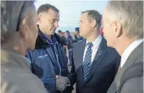  ?? BILL INGALLS/NASA ?? Expedition 57 flight engineer Nick Hague, left, is greeted by NASA Administra­tor Jim Bridenstin­e after last week’s failed launch.