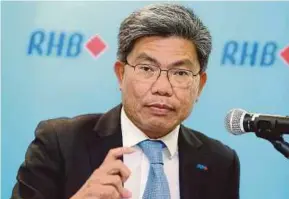  ??  ?? RHB Bank Bhd group managing director Datuk Khairussal­eh Ramli says banking sector is expected to see signs of modest growth