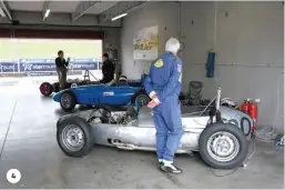  ?? ?? 4. Historic single-seaters in the pits;
