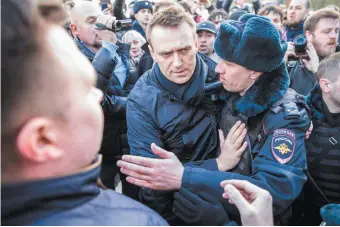  ??  ?? The Russian opposition leader Alexei Navalny being detained during a rally in Moscow, March 26, 2017