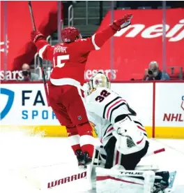  ?? AP ?? Red Wings forward Jakub Vrana celebrates after his goal against Kevin Lankinen during the second period. The Red Wings scored three times in the period.