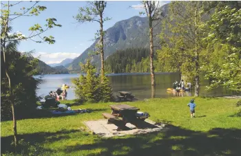  ?? JASON PAYNE FILES ?? If you plan to drive to Buntzen lake, you'll have to book a parking spot online. One letter writer says the park is long overdue for a parking lot upgrade.