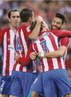  ?? | GETTY IMAGES ?? Atlético de Madrid comparte el liderato con el Real Madrid tras golear al Granada de Guillermo Ochoa.