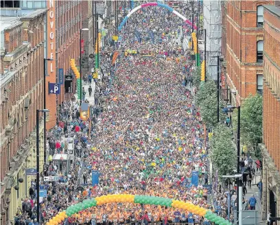  ??  ?? ●●Thousands line up at the start of The Great Manchester Run