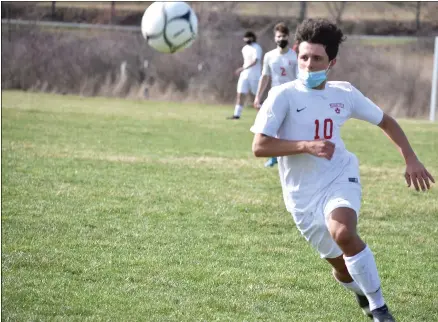  ?? BY KYLE ADAMS KADAMS@SARATOGIAN.COM @KASPORTSNE­WS ON TWITTER ?? Andrew Kraszewski goes after the ball on April 9, 2021.